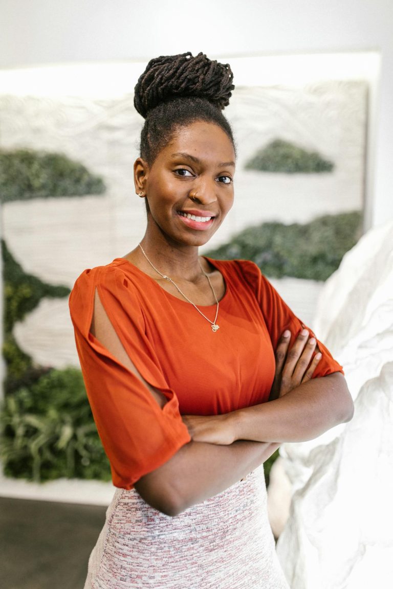 Woman in Orange Dress Smiling